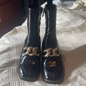 Elegant Black Boots with Chain Detail